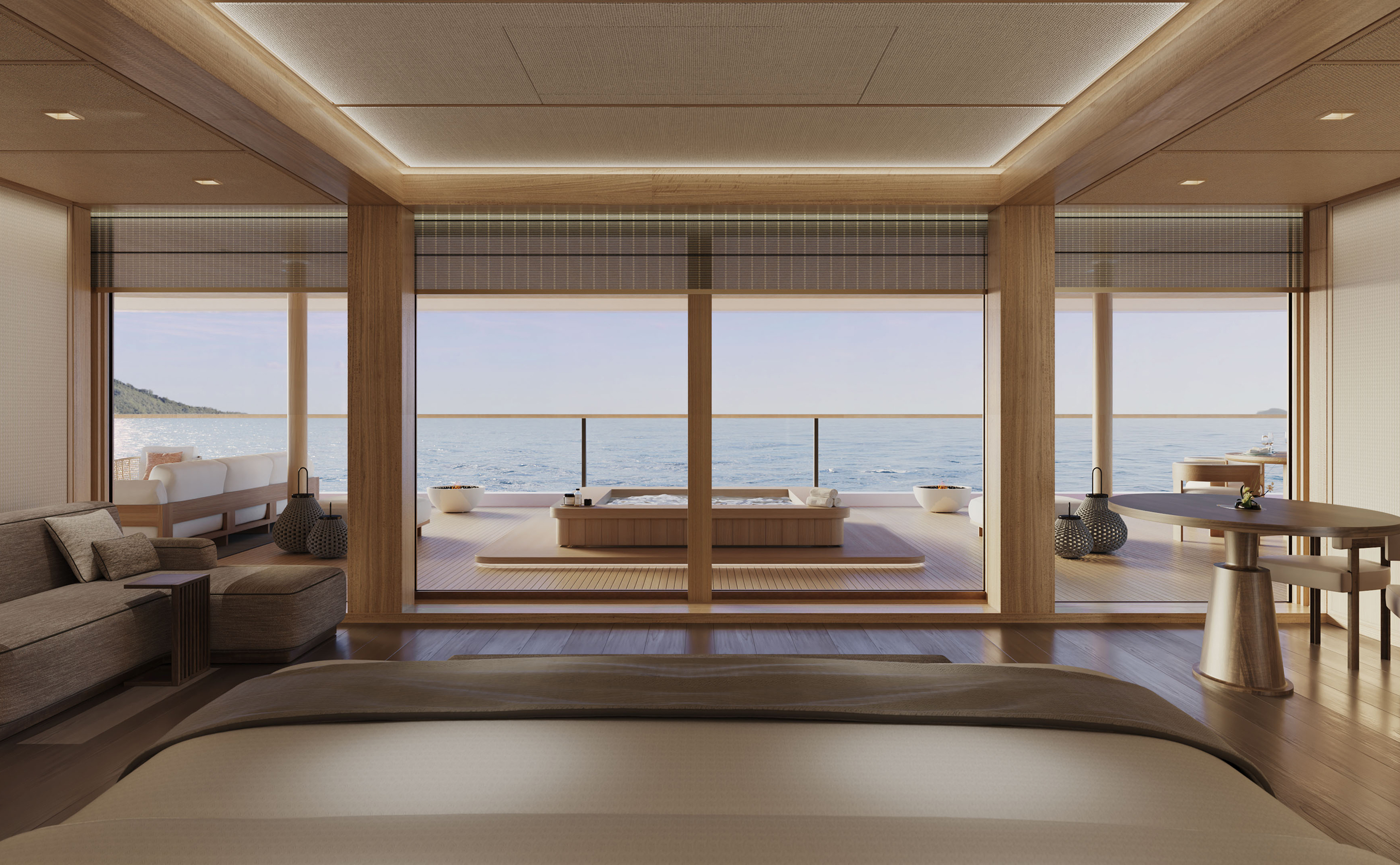 Aman Suite bedroom opening to its private whirlpool aboard Amangati