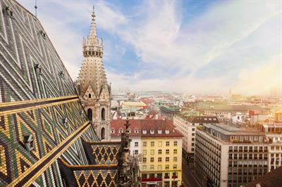 St. Stephen Cathedral roof in Vienna, Austria overlooking the city | Crystal