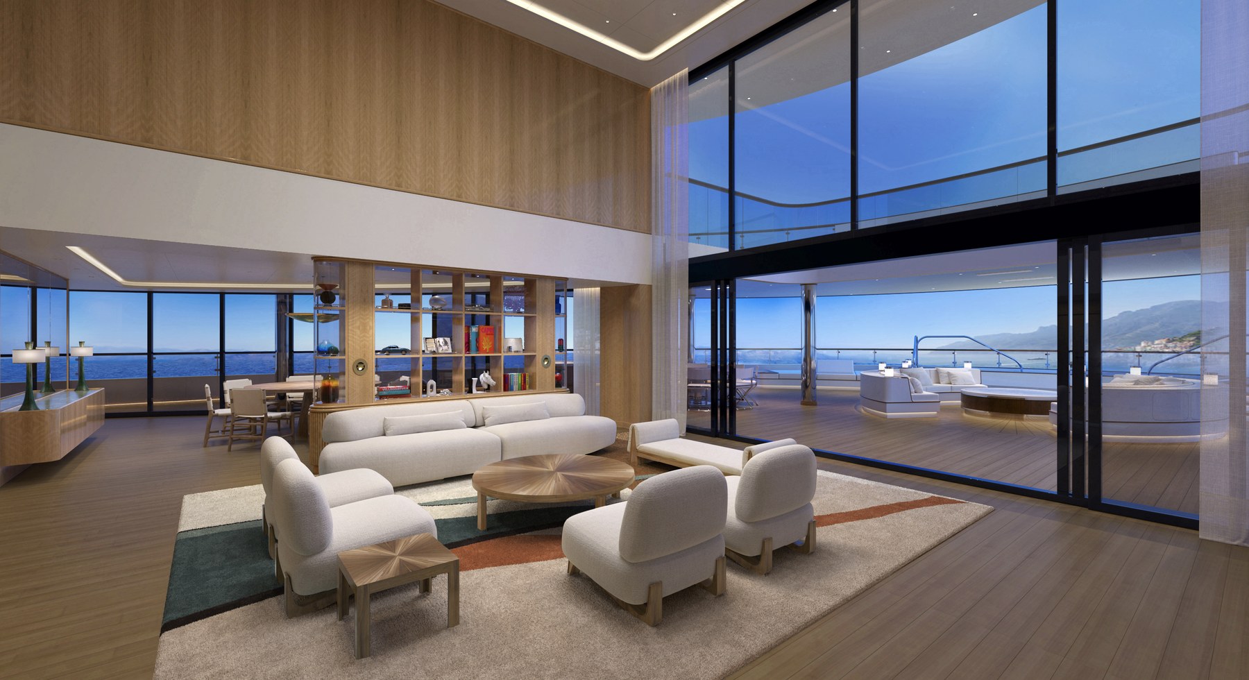 Four Seasons One Loft Suite two-level living room with wraparound windows