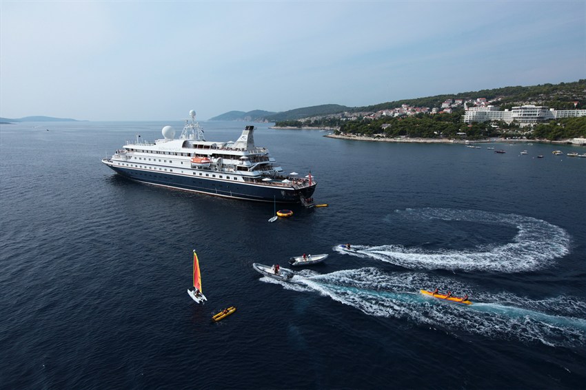 SeaDream yacht with marina water sports beside the ship