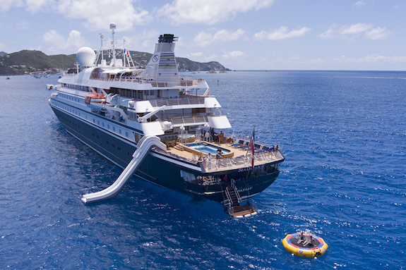 SeaDream II yacht with its marina and waterslide deployed