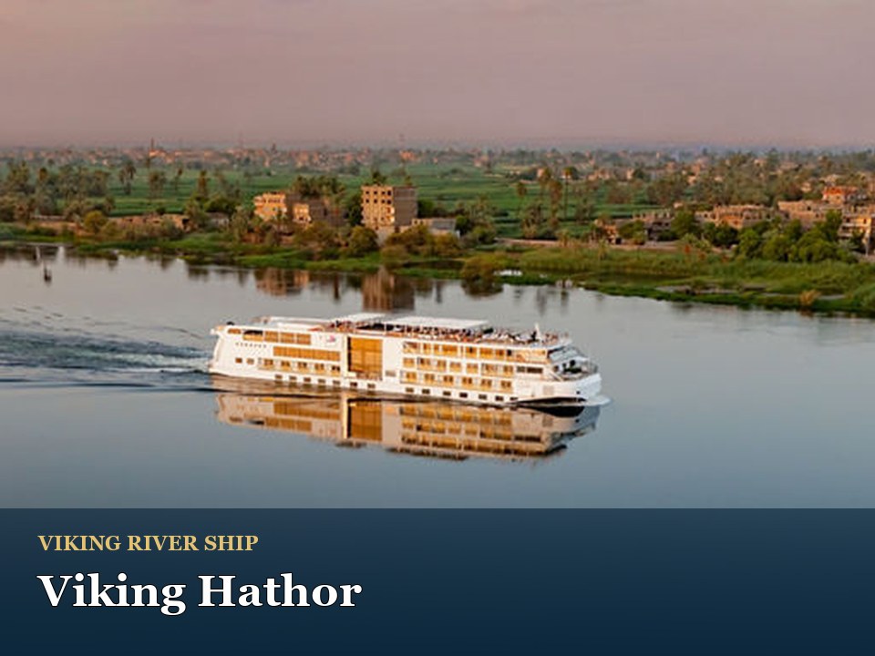 Viking Hathor cruise ship — River cruise ship sailing at sunset