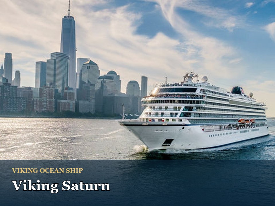 Viking Saturn cruise ship — Luxury cruise ship sailing near city skyline