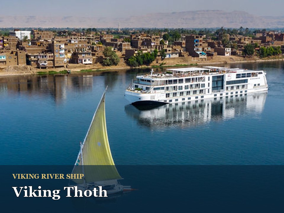 Viking Thoth cruise ship — Sailboat and cruise ship on calm river