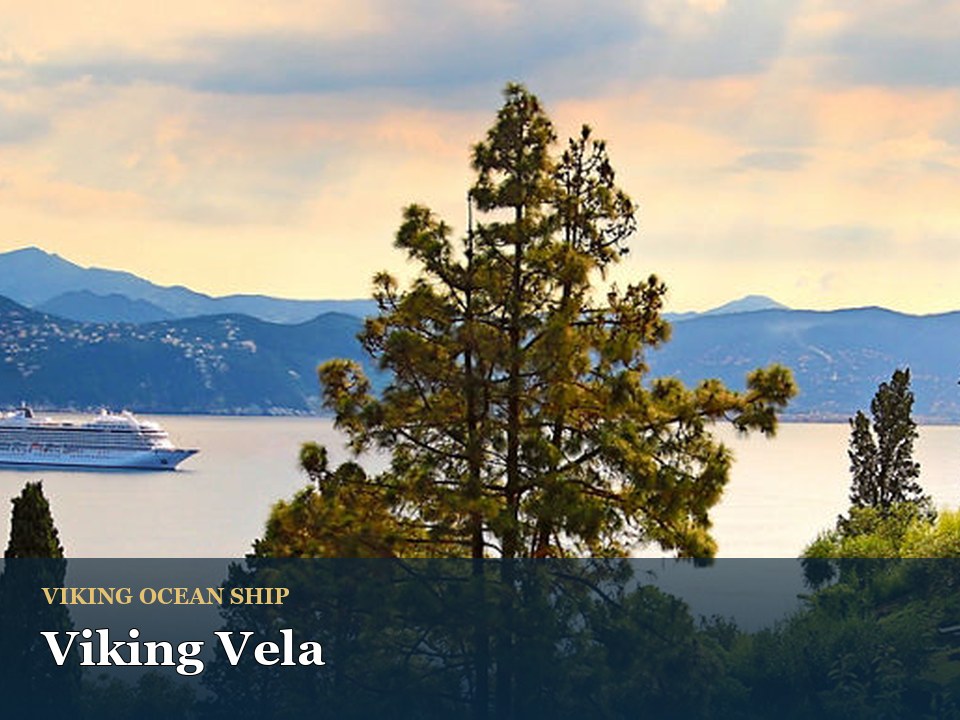 Viking Vela cruise ship — Scenic coastal view with cruise ship