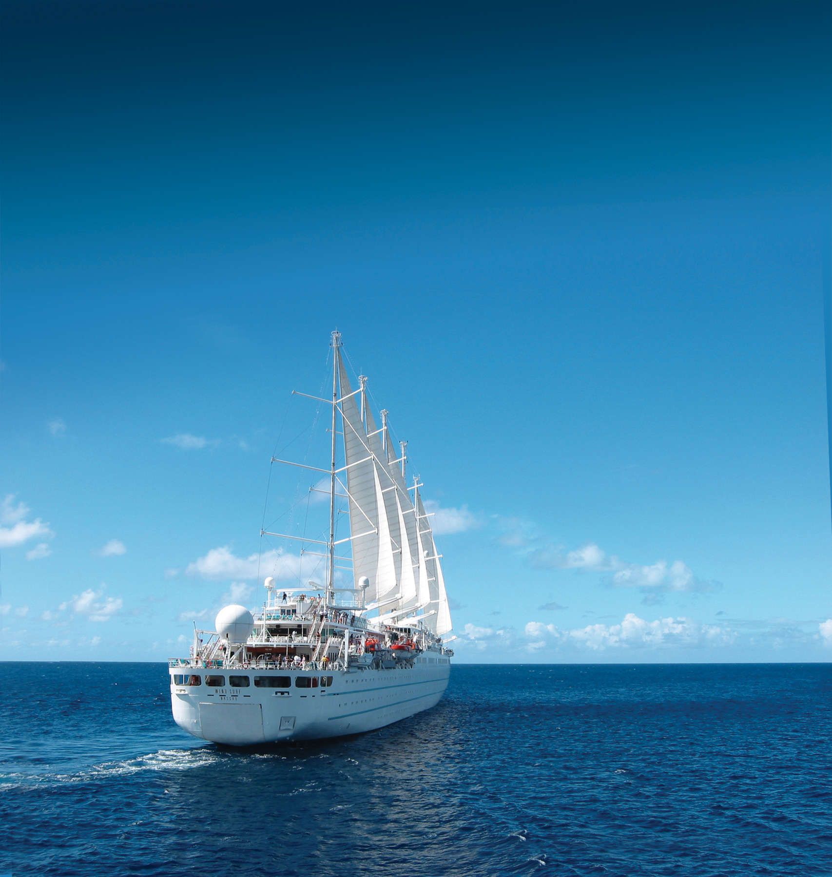 Wind Surf sailing under five masts